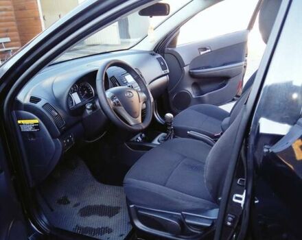 Черный Хендай i30, объемом двигателя 1.6 л и пробегом 232 тыс. км за 6600 $, фото 6 на Automoto.ua