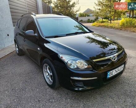 Черный Хендай i30, объемом двигателя 1.6 л и пробегом 200 тыс. км за 5500 $, фото 9 на Automoto.ua
