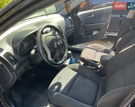 Черный Хендай i30, объемом двигателя 1.58 л и пробегом 234 тыс. км за 5650 $, фото 11 на Automoto.ua