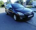 Черный Хендай i30, объемом двигателя 1.6 л и пробегом 232 тыс. км за 6600 $, фото 1 на Automoto.ua