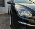 Черный Хендай i30, объемом двигателя 1.6 л и пробегом 200 тыс. км за 5500 $, фото 2 на Automoto.ua