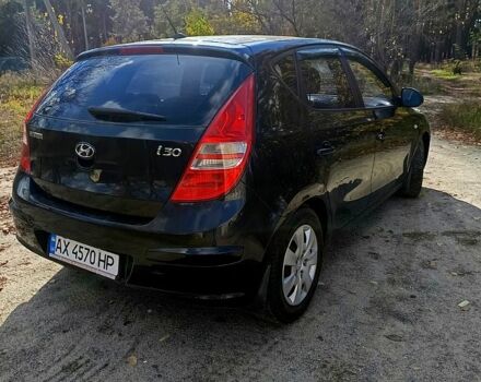 Чорний Хендай i30, об'ємом двигуна 1.4 л та пробігом 172 тис. км за 5300 $, фото 4 на Automoto.ua