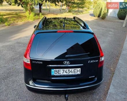 Черный Хендай i30, объемом двигателя 1.6 л и пробегом 200 тыс. км за 5500 $, фото 4 на Automoto.ua