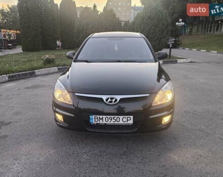Черный Хендай i30, объемом двигателя 1.59 л и пробегом 207 тыс. км за 6250 $, фото 5 на Automoto.ua