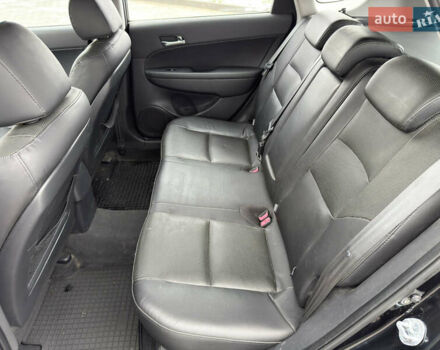 Черный Хендай i30, объемом двигателя 1.6 л и пробегом 169 тыс. км за 6150 $, фото 24 на Automoto.ua