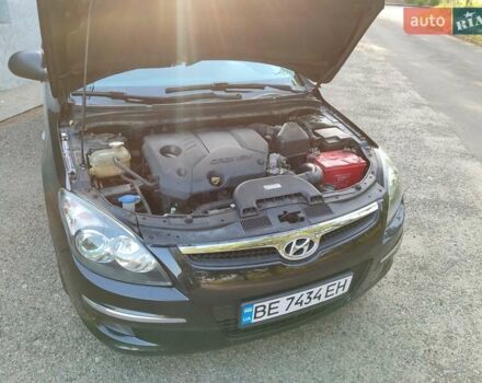 Черный Хендай i30, объемом двигателя 1.6 л и пробегом 200 тыс. км за 5500 $, фото 16 на Automoto.ua