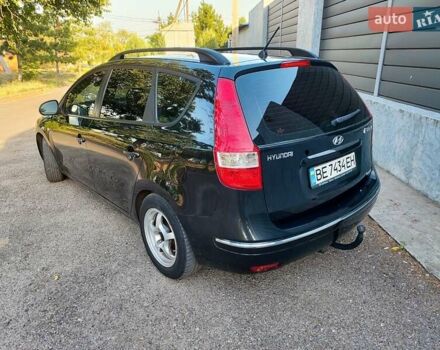 Черный Хендай i30, объемом двигателя 1.6 л и пробегом 200 тыс. км за 5500 $, фото 6 на Automoto.ua