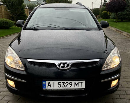 Черный Хендай i30, объемом двигателя 1.58 л и пробегом 341 тыс. км за 6200 $, фото 4 на Automoto.ua