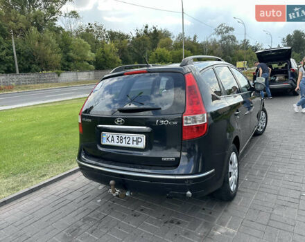 Черный Хендай i30, объемом двигателя 1.58 л и пробегом 257 тыс. км за 5650 $, фото 3 на Automoto.ua