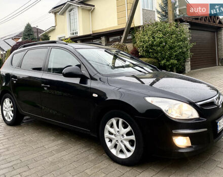 Черный Хендай i30, объемом двигателя 1.58 л и пробегом 341 тыс. км за 6200 $, фото 6 на Automoto.ua