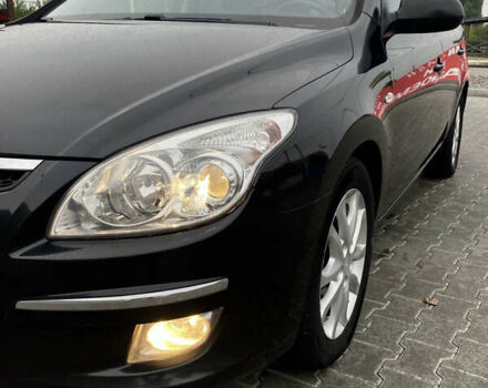Черный Хендай i30, объемом двигателя 1.58 л и пробегом 341 тыс. км за 6200 $, фото 8 на Automoto.ua