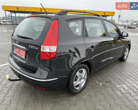Черный Хендай i30, объемом двигателя 1.6 л и пробегом 169 тыс. км за 6150 $, фото 6 на Automoto.ua