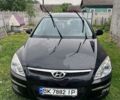 Черный Хендай i30, объемом двигателя 1.6 л и пробегом 165 тыс. км за 6000 $, фото 1 на Automoto.ua