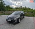 Черный Хендай i30, объемом двигателя 1.58 л и пробегом 255 тыс. км за 5500 $, фото 1 на Automoto.ua
