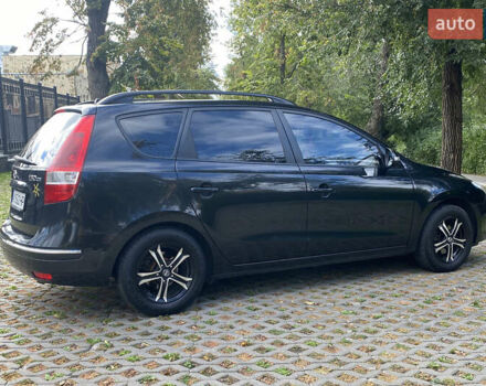 Чорний Хендай i30, об'ємом двигуна 1.6 л та пробігом 232 тис. км за 6200 $, фото 4 на Automoto.ua