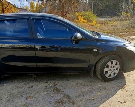 Чорний Хендай i30, об'ємом двигуна 1.4 л та пробігом 172 тис. км за 5300 $, фото 3 на Automoto.ua