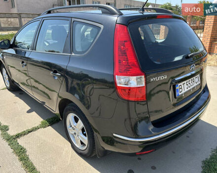 Черный Хендай i30, объемом двигателя 1.59 л и пробегом 226 тыс. км за 6500 $, фото 4 на Automoto.ua