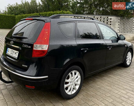 Черный Хендай i30, объемом двигателя 1.58 л и пробегом 341 тыс. км за 6200 $, фото 11 на Automoto.ua