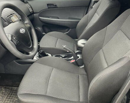 Черный Хендай i30, объемом двигателя 1.4 л и пробегом 228 тыс. км за 5800 $, фото 4 на Automoto.ua