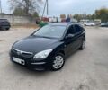 Черный Хендай i30, объемом двигателя 1.6 л и пробегом 262 тыс. км за 5600 $, фото 1 на Automoto.ua