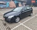 Черный Хендай i30, объемом двигателя 1.6 л и пробегом 128 тыс. км за 7100 $, фото 1 на Automoto.ua