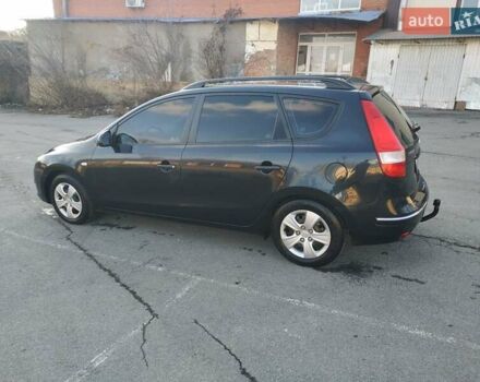 Черный Хендай i30, объемом двигателя 1.4 л и пробегом 158 тыс. км за 5600 $, фото 9 на Automoto.ua