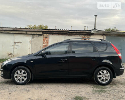 Чорний Хендай i30, об'ємом двигуна 1.59 л та пробігом 247 тис. км за 6250 $, фото 1 на Automoto.ua