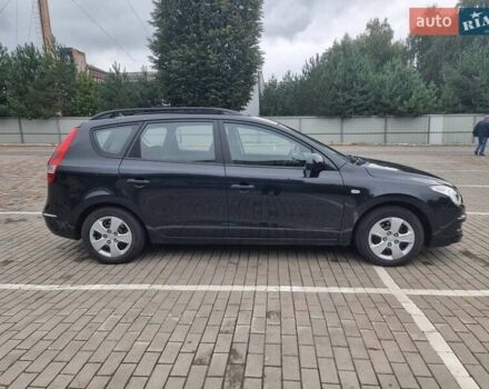 Черный Хендай i30, объемом двигателя 1.6 л и пробегом 128 тыс. км за 7700 $, фото 1 на Automoto.ua