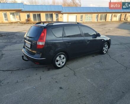 Черный Хендай i30, объемом двигателя 1.4 л и пробегом 158 тыс. км за 5600 $, фото 5 на Automoto.ua