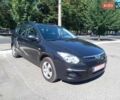 Черный Хендай i30, объемом двигателя 1.4 л и пробегом 257 тыс. км за 6550 $, фото 1 на Automoto.ua