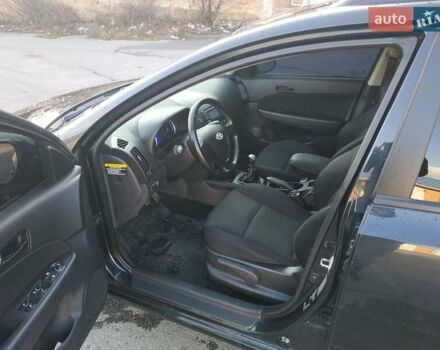 Черный Хендай i30, объемом двигателя 1.4 л и пробегом 158 тыс. км за 5600 $, фото 13 на Automoto.ua