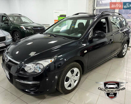 Черный Хендай i30, объемом двигателя 1.4 л и пробегом 190 тыс. км за 6900 $, фото 2 на Automoto.ua