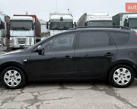 Черный Хендай i30, объемом двигателя 1.6 л и пробегом 265 тыс. км за 5900 $, фото 1 на Automoto.ua