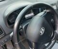 Черный Хендай i30, объемом двигателя 1.4 л и пробегом 200 тыс. км за 6500 $, фото 1 на Automoto.ua