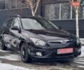 Черный Хендай i30, объемом двигателя 1.4 л и пробегом 216 тыс. км за 5900 $, фото 1 на Automoto.ua