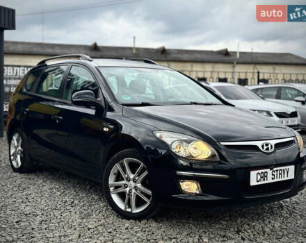 Черный Хендай i30, объемом двигателя 1.6 л и пробегом 187 тыс. км за 6900 $, фото 1 на Automoto.ua