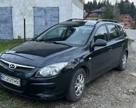 Черный Хендай i30, объемом двигателя 1.58 л и пробегом 243 тыс. км за 5500 $, фото 1 на Automoto.ua