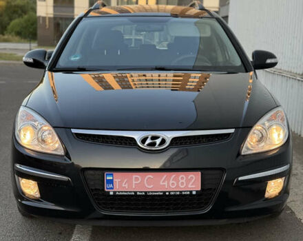 Чорний Хендай i30, об'ємом двигуна 1.6 л та пробігом 198 тис. км за 6400 $, фото 4 на Automoto.ua