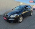 Черный Хендай i30, объемом двигателя 1.6 л и пробегом 231 тыс. км за 5250 $, фото 1 на Automoto.ua