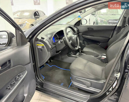 Черный Хендай i30, объемом двигателя 1.4 л и пробегом 190 тыс. км за 6900 $, фото 4 на Automoto.ua