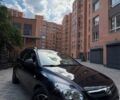 Черный Хендай i30, объемом двигателя 1.6 л и пробегом 246 тыс. км за 6000 $, фото 1 на Automoto.ua