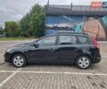 Черный Хендай i30, объемом двигателя 1.6 л и пробегом 128 тыс. км за 7700 $, фото 1 на Automoto.ua
