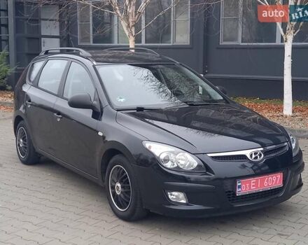 Черный Хендай i30, объемом двигателя 1.4 л и пробегом 216 тыс. км за 6300 $, фото 1 на Automoto.ua
