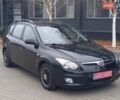 Черный Хендай i30, объемом двигателя 1.4 л и пробегом 216 тыс. км за 6300 $, фото 1 на Automoto.ua