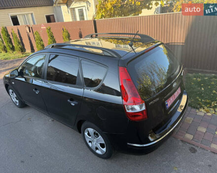 Хендай i30 2009 в Борисполе на Automoto.ua Черный Хендай i30, объемом двигателя 1.6 л и пробегом 229 тыс. км за 7000 $, фото 14 на Automoto.ua