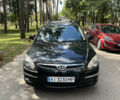 Черный Хендай i30, объемом двигателя 1.4 л и пробегом 241 тыс. км за 5600 $, фото 1 на Automoto.ua