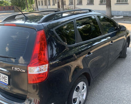 Черный Хендай i30, объемом двигателя 1.4 л и пробегом 92 тыс. км за 5800 $, фото 3 на Automoto.ua