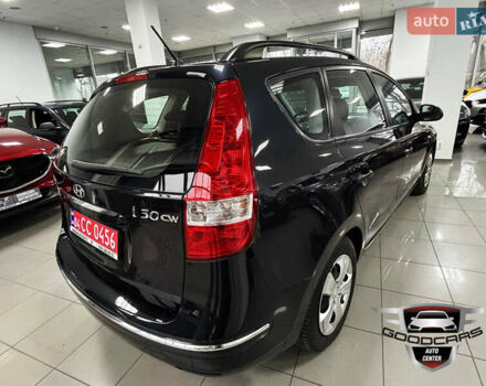 Черный Хендай i30, объемом двигателя 1.4 л и пробегом 190 тыс. км за 6900 $, фото 1 на Automoto.ua