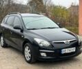 Черный Хендай i30, объемом двигателя 1.6 л и пробегом 265 тыс. км за 6200 $, фото 4 на Automoto.ua