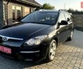 Черный Хендай i30, объемом двигателя 1.6 л и пробегом 220 тыс. км за 6100 $, фото 3 на Automoto.ua